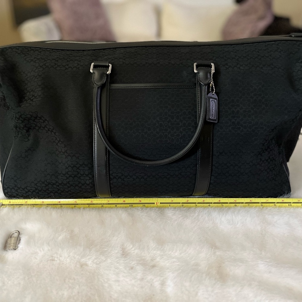 Coach Black Duffel Bag with Sturdy Fabric and Short Handles